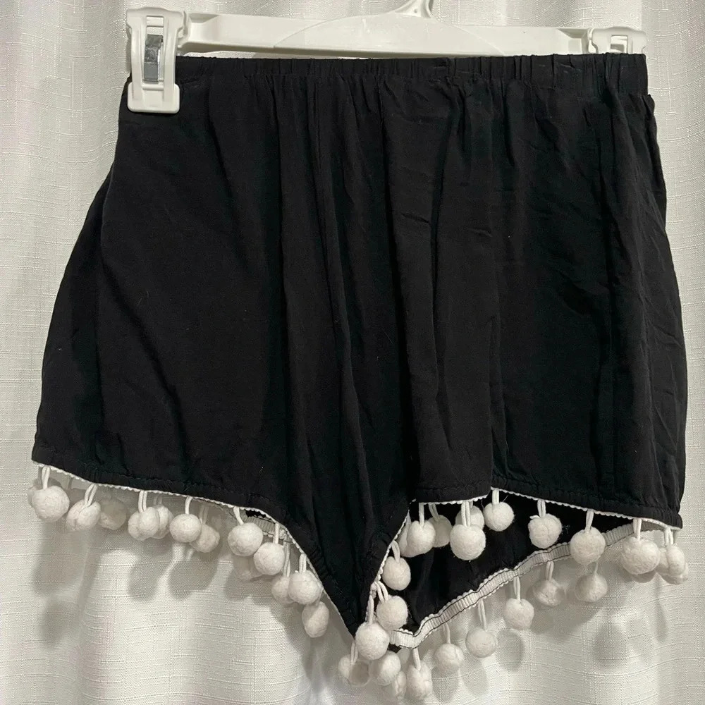Black shorts with white trim